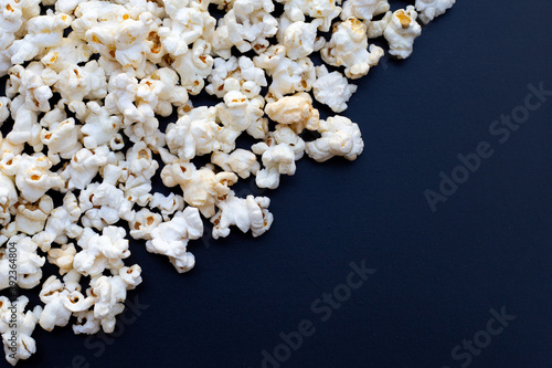 Popcorn on dark background. Copy space