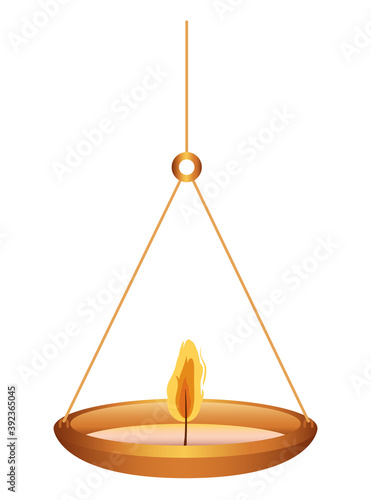 candle of orange color on a chandelier
