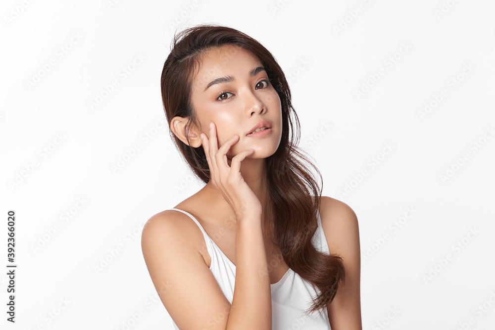 Beautiful young asian woman with clean fresh skin on white background, Face care, Facial treatment, Cosmetology, beauty and spa, Asian women portrait Beautiful young asian woman with clean fresh skin on white background, Face care, Facial treatment, Cosmetology, beauty and spa, Asian women portrait