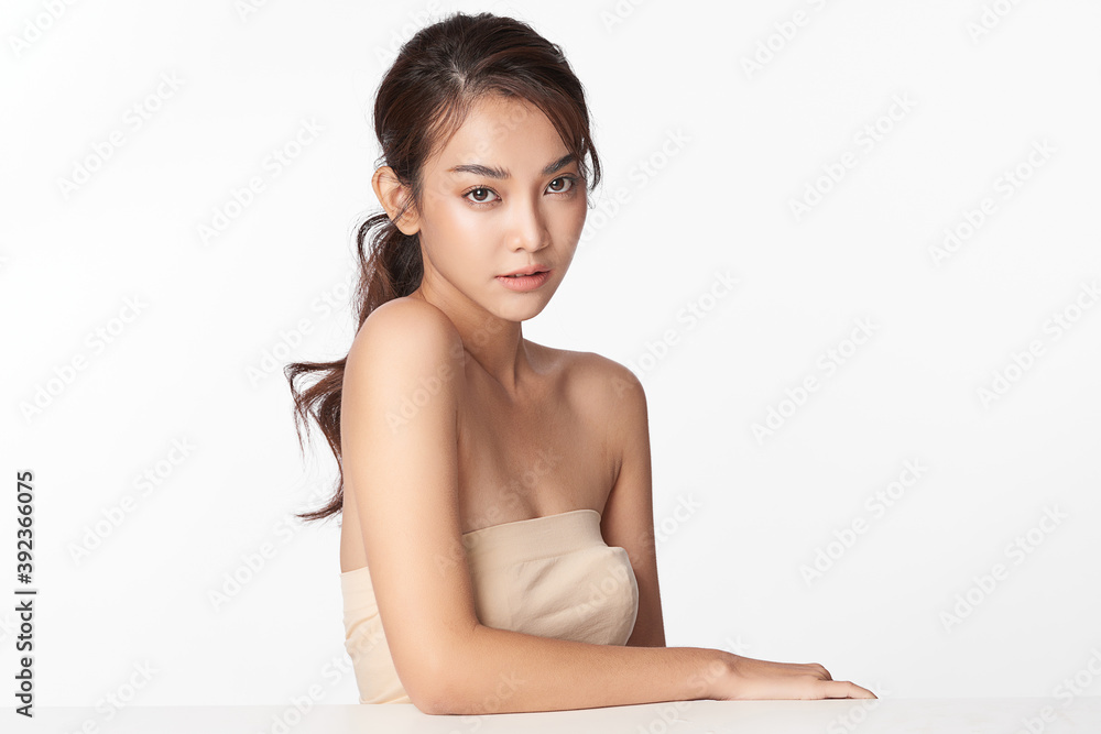 Beautiful young asian woman with clean fresh skin on white background, Face care, Facial treatment, Cosmetology, beauty and spa, Asian women portrait Beautiful young asian woman with clean fresh skin on white background, Face care, Facial treatment, Cosmetology, beauty and spa, Asian women portrait