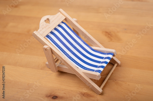 booking summer vacation beach chair concept