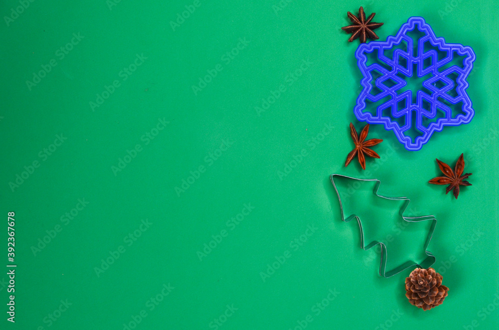 Christmas cookie molds in the shape of a christmas tree and snowflake, creative food concept Christmas cookie molds in the shape of a christmas tree and snowflake, creative food concept