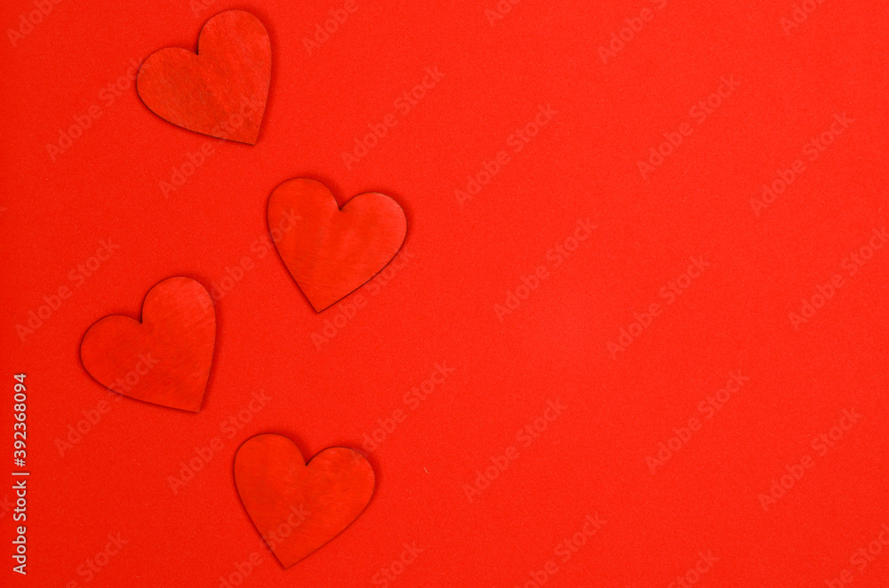 wooden ornaments red hearts isolated on bright background