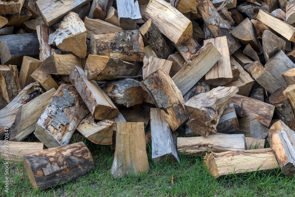 Abstract wooden texture of firewood (background) Abstract wooden texture of firewood (background)