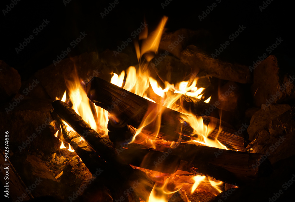 burning firewood and camp fire at night burning firewood and camp fire at night
