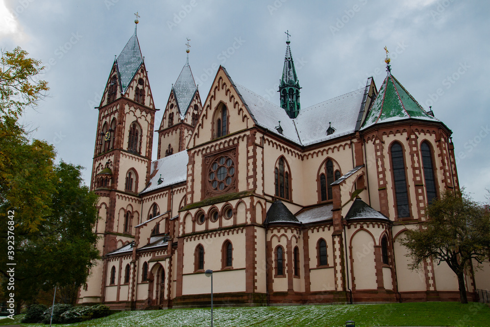 Freiburg im Breisgau/Germany - 10 28 2012: Herz-Jesu-Kirche in Freiburg in a cloudy autumn day after first snow Freiburg im Breisgau/Germany - 10 28 2012: Herz-Jesu-Kirche in Freiburg in a cloudy autumn day after first snow