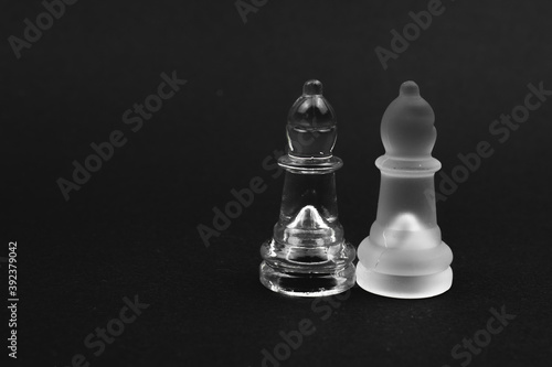 Obraz na plátne glass chess bishop pieces on black