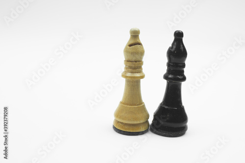 wood chess pieces on white