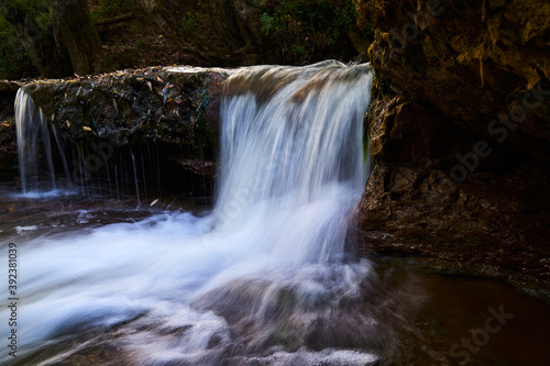Fototapeta Naklejka Na Ścianę i Meble -  Waterfall on a mountain river.