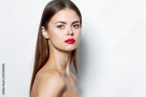 woman Bare shoulders attractive clear skin look red lips 