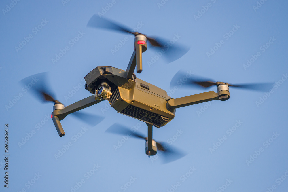 Flying quadcopter close-up Flying quadcopter close-up