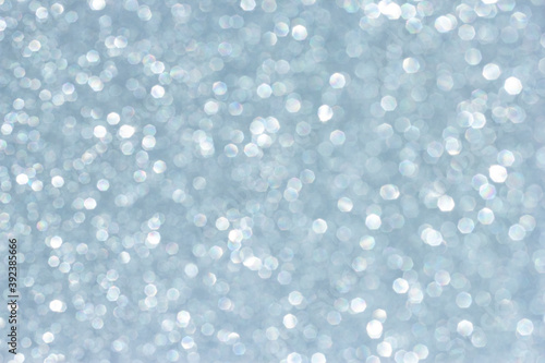 blurry background with glitter. abstract shining silver background.