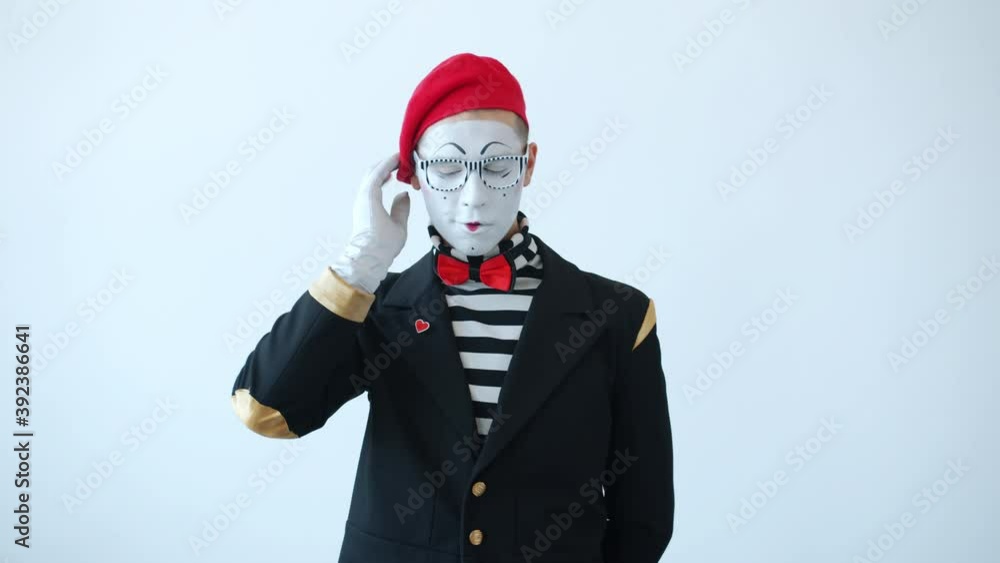 Slow motion of mime scratching head then raising finger having good idea rubbing fingers anticipating great plan. Creative people and pantomime concept. Slow motion of mime scratching head then raising finger having good idea rubbing fingers anticipating great plan. Creative people and pantomime concept.