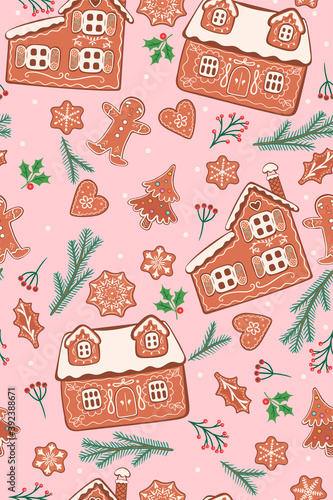 Seamless pattern with gingerbread cookies and winter flora on a pink background. Vector graphics.