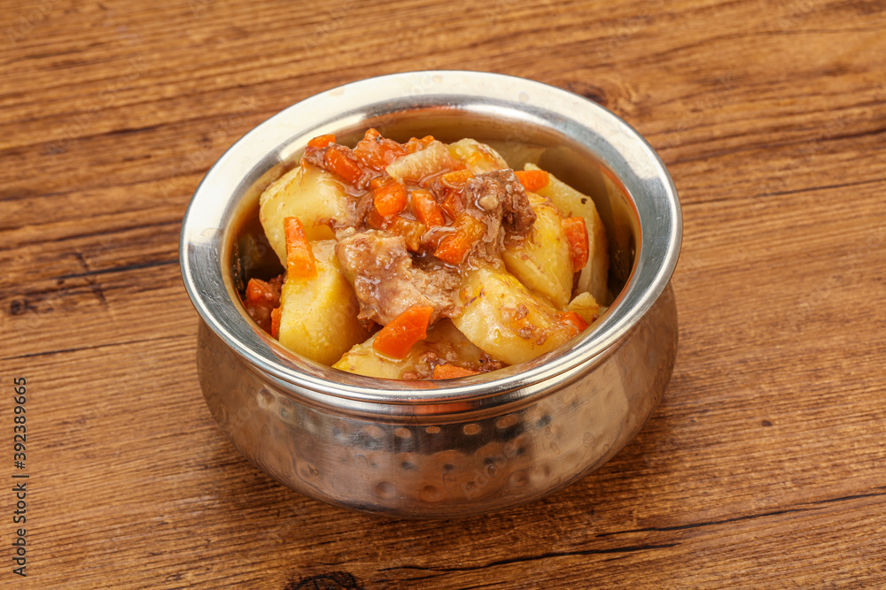 Roasted potato and beef with sauce Roasted potato and beef with sauce