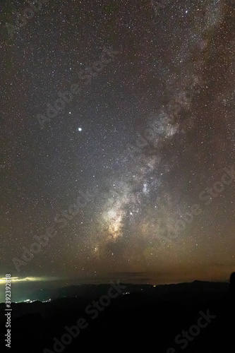 Night landscape with colorful Milky Way