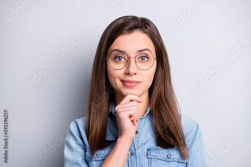 Close up photo of adorable person holding arm on chin thinking eyewear isolated on grey color background