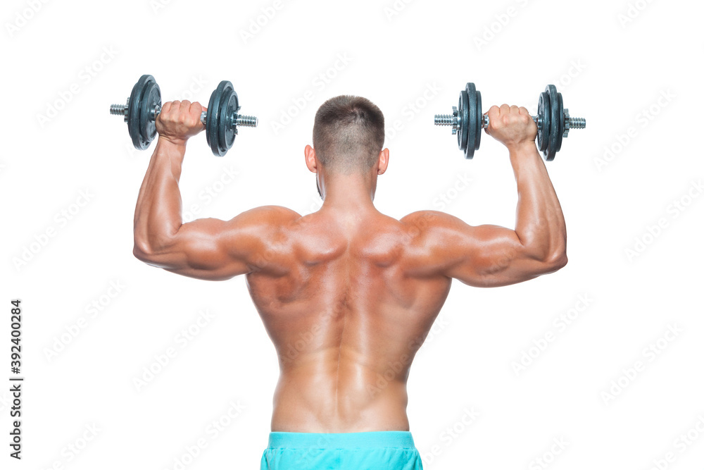 Back view of muscular body and strong hands lifting heavy dumbbells isolated over white background