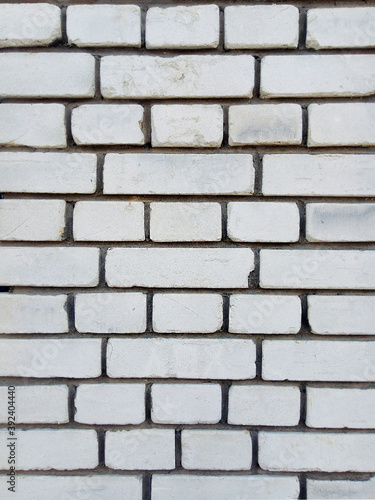 Brickwork. White silicate brick wall. Abstract background. Vertical frame
