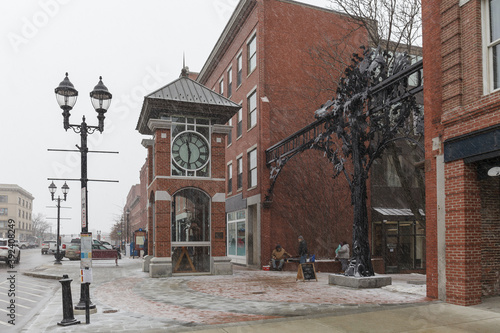 Фотография CONCORD, NH, USA - FEBRUARY 18, 2020: Clock on Main street