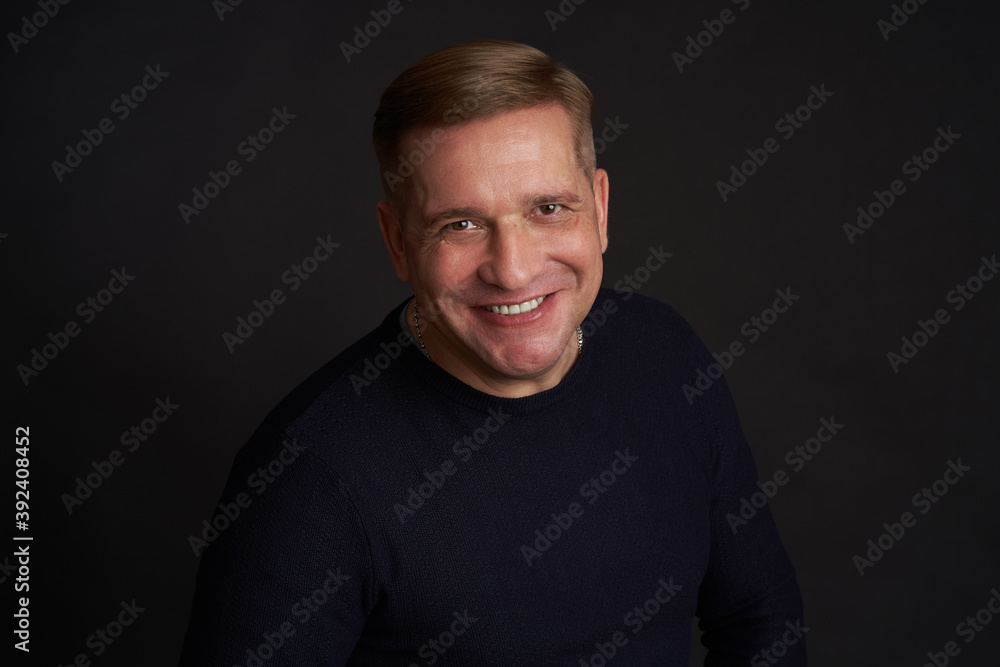 Studio portrait of a 40 years old caucasian man