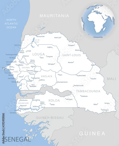 Blue-gray detailed map of Senegal administrative divisions and location on the globe.