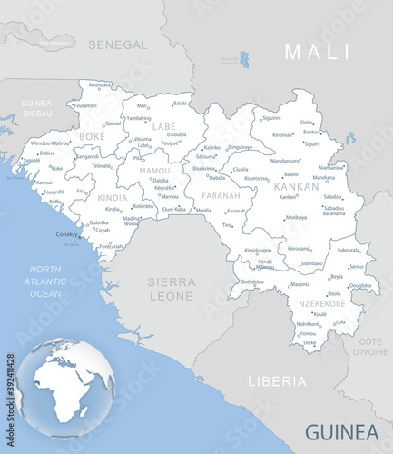 Blue-gray detailed map of Guinea administrative divisions and location on the globe. Vector illustration