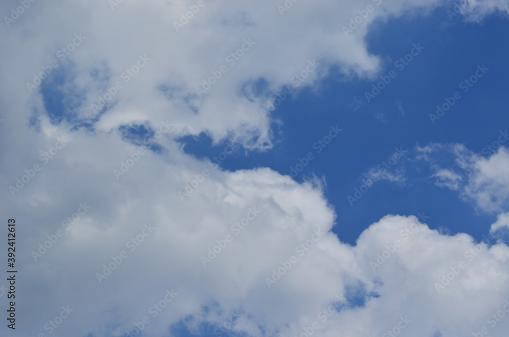 Beautiful summer blue sky with white fluffy clouds. Beautiful summer blue sky with white fluffy clouds.