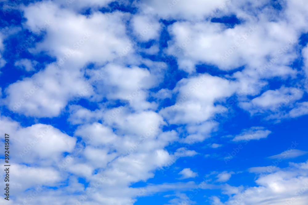 White clouds are on a clear blue sky White clouds are on a clear blue sky