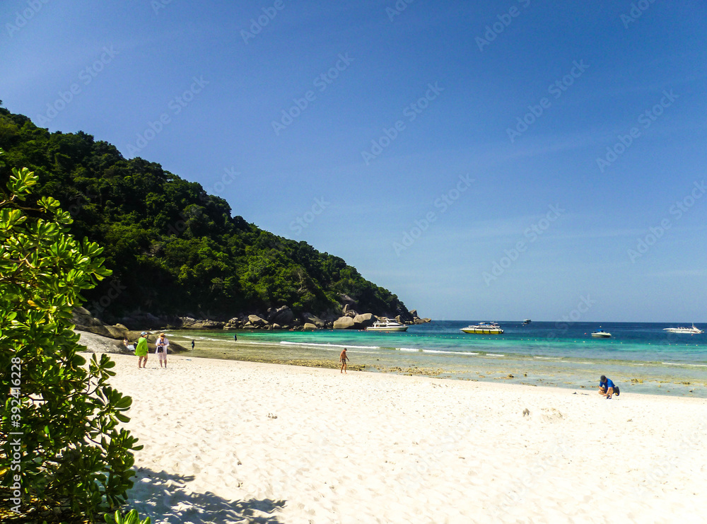 White sand beach on the shores of the Andaman Sea in Thailand.