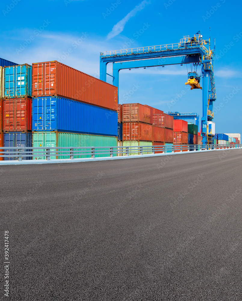 Fototapeta premium Containers on the wharf. International shipping logistics.