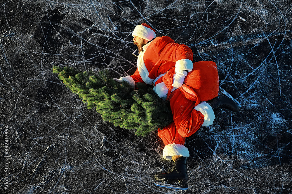 Santa Claus hurries to meet the New Year with gifts and Christmas tree. Santa Claus on ice skates goes to Christmas. Santa Claus hurries to meet the New Year with gifts and Christmas tree. Santa Claus on ice skates goes to Christmas.