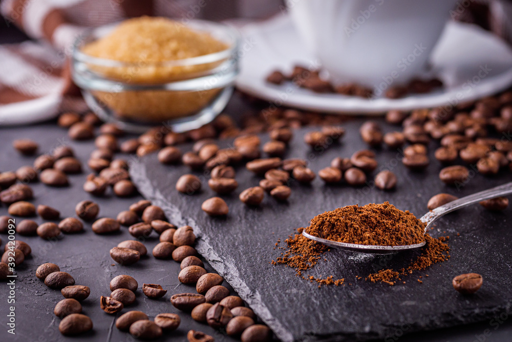 cup of fragrant fresh coffee on a dark stone background cup of fragrant fresh coffee on a dark stone background