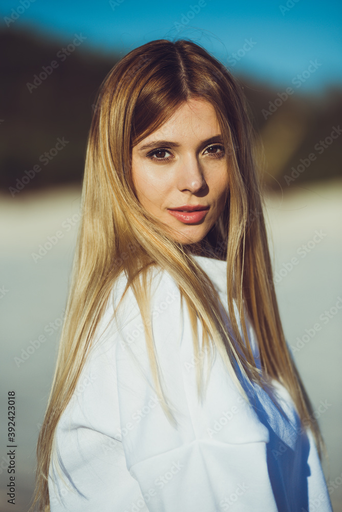 Fashion woman portrait on the beach Fashion woman portrait on the beach