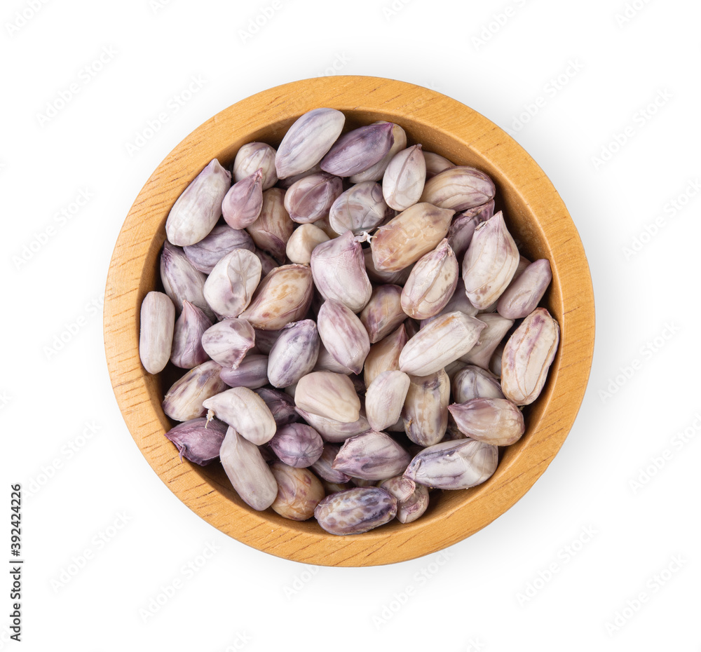 Peanuts in a bowl isolated on white background. Top view