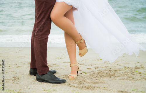 bride and groom on beach