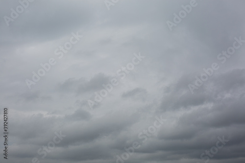 Cloudy sky with gray clouds. Storm