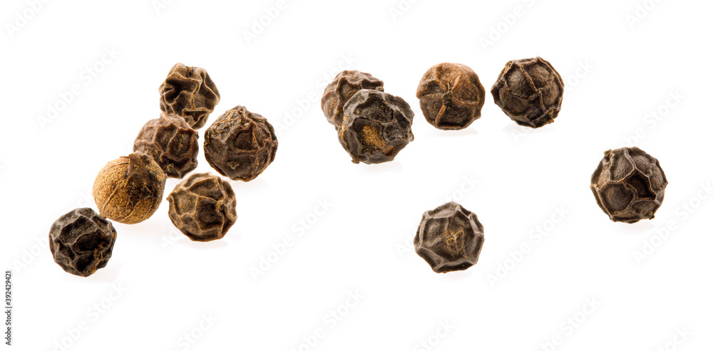 Ground black pepper isolated on a white background top view Ground black pepper isolated on a white background top view