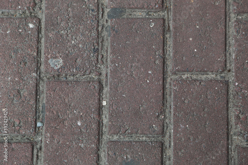 Top view of a cobblestone pavement at daylight - perfect for overlays and textures photo