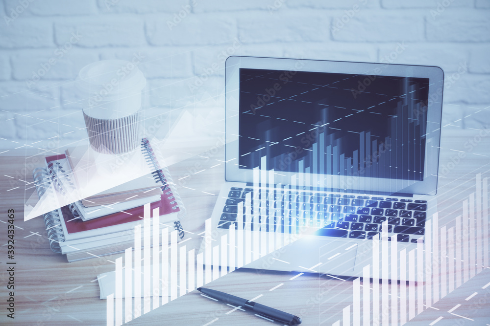 Stock market graph and table with computer background. Double exposure. Concept of financial analysis. Stock market graph and table with computer background. Double exposure. Concept of financial analysis.