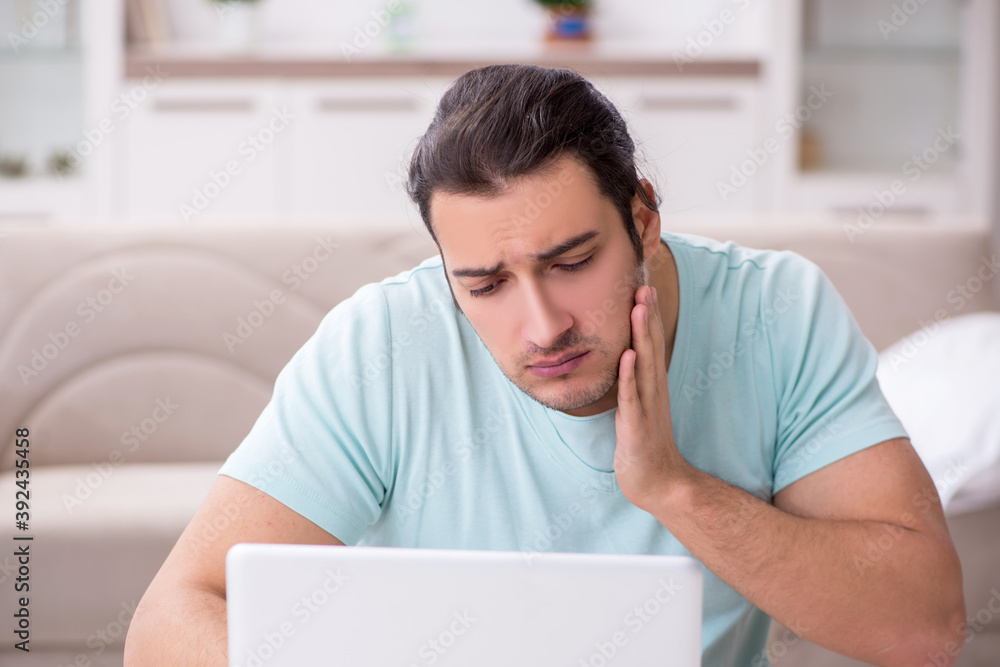 Young man suffering from toothache Young man suffering from toothache