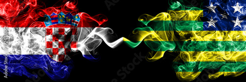 Croatia  Croatian vs Brazil  Brazilian  Goias smoky mystic flags placed side by side. Thick colored silky abstract smoke flags.