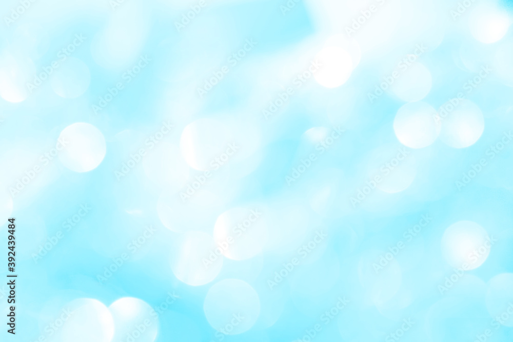 Bokeh light on blue background, sky with circle glitter light blue. Snow abstract soft glowing with vivid bright light and bokeh blur effect. Bokeh light on blue background, sky with circle glitter light blue. Snow abstract soft glowing with vivid bright light and bokeh blur effect.