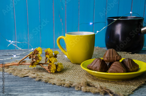 Still life with coffee beans on the wooden background