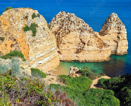 The beauty of Portugal - hiking in Lagos at the blue Atlantic ocean in Portugal