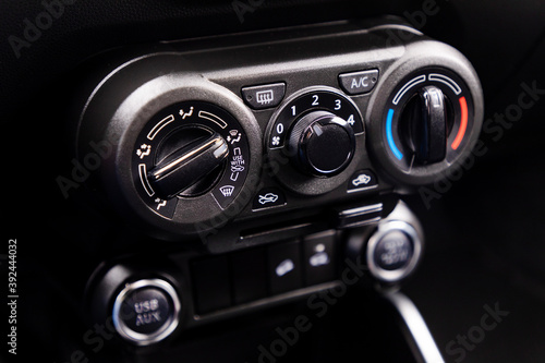 Air-condition controls in interior of a car © yakub88