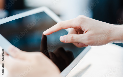 Obraz na płótnie person using tablet computer