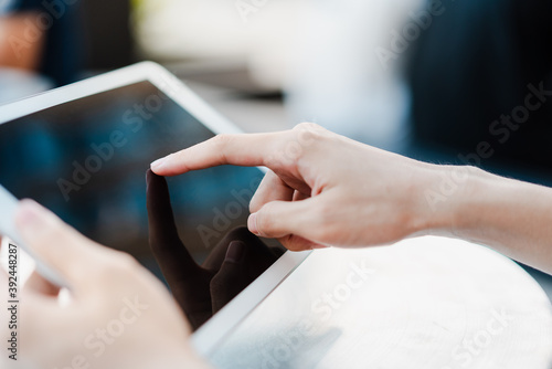 person using tablet computer