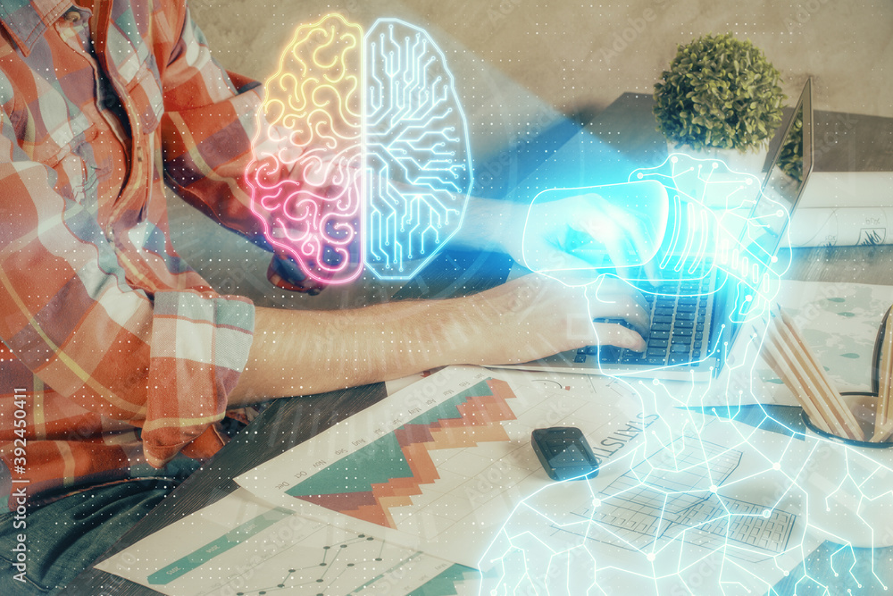 AR hologram with man working on computer on background. Augmented reality concept. Double exposure.