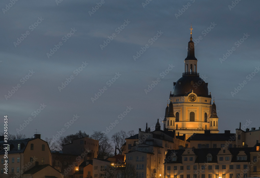Night view at sunrise of the district Södermalm and the church Katarina Kyrka in Stockholm
